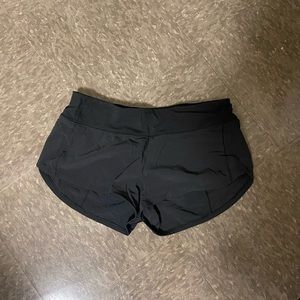 Black Lululemon Speed Up low rise 2.5’ inseam shorts